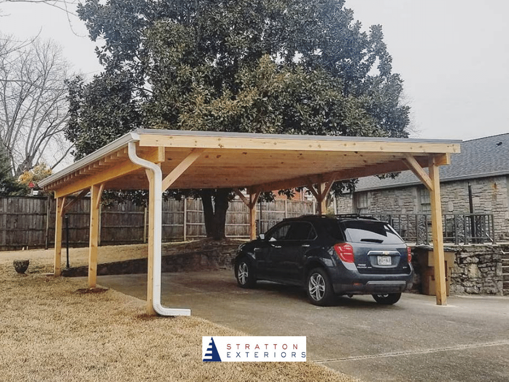 Stratton Exteriors Carport with Car Underneath